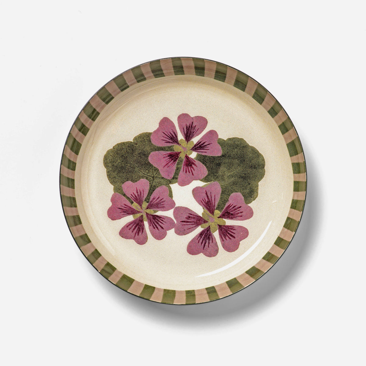 Add a beautiful botanical detail to your home with the Geranium Round Enamel Trinket Tray by Roomytown. This elegant botanical trinket tray features a delicate geranium illustration taken from an 18th-century herbarium created using nature printing circa 1733. Roomytown’s design team has carefully adapted the original botanical artwork, preserving its vintage character while giving the Geranium Enamel Trinket Tray a fresh and decorative feel.