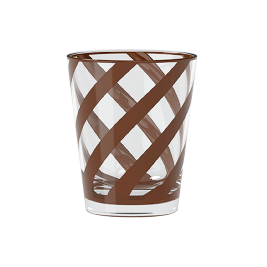 Clear glass tumbler with brown woven design on a white background