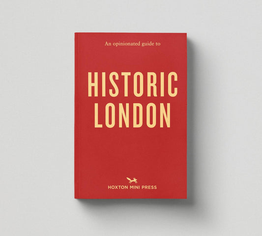 Book titled 'An Opinionated Guide to Historic London' by Hoxton Mini Press on a gray background