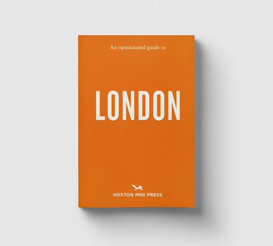 A book cover for 'LONDON: An opinionated guide to' by Hoxton Mini Press, featuring a solid orange background with white text and a small white airplane logo, shown on a light gray background with a drop shadow.