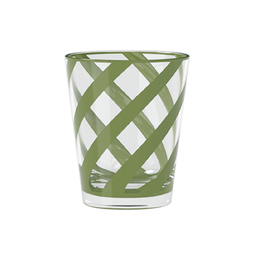 Clear glass tumbler with green woven pattern on a white background