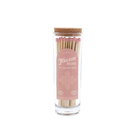 Jar of matches with pink matches and a clear label on a white background