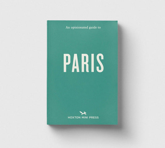 A book cover for 'An opinionated guide to PARIS' by Hoxton Mini Press, featuring a solid teal-green background with white text and a small white airplane logo, shown against a light gray background with a soft drop shadow.