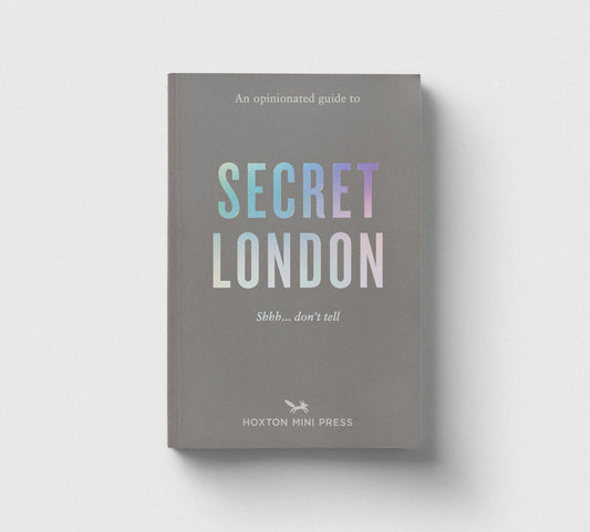 Book titled 'Secret London' with a gray cover on a white background