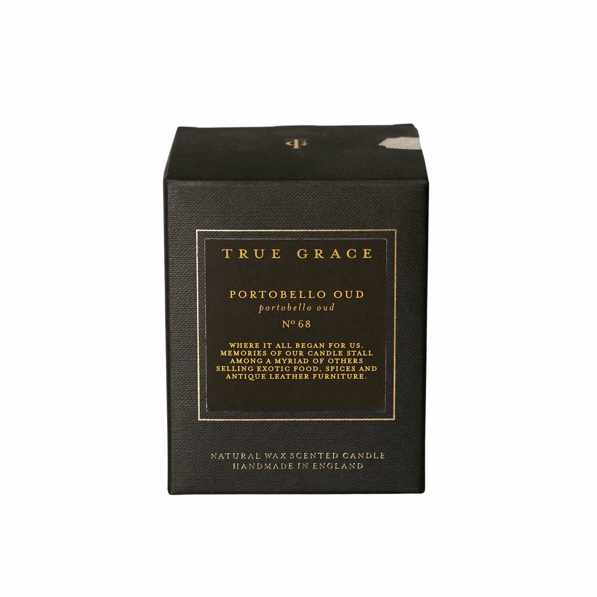 Black candle box with gold text on a white background
