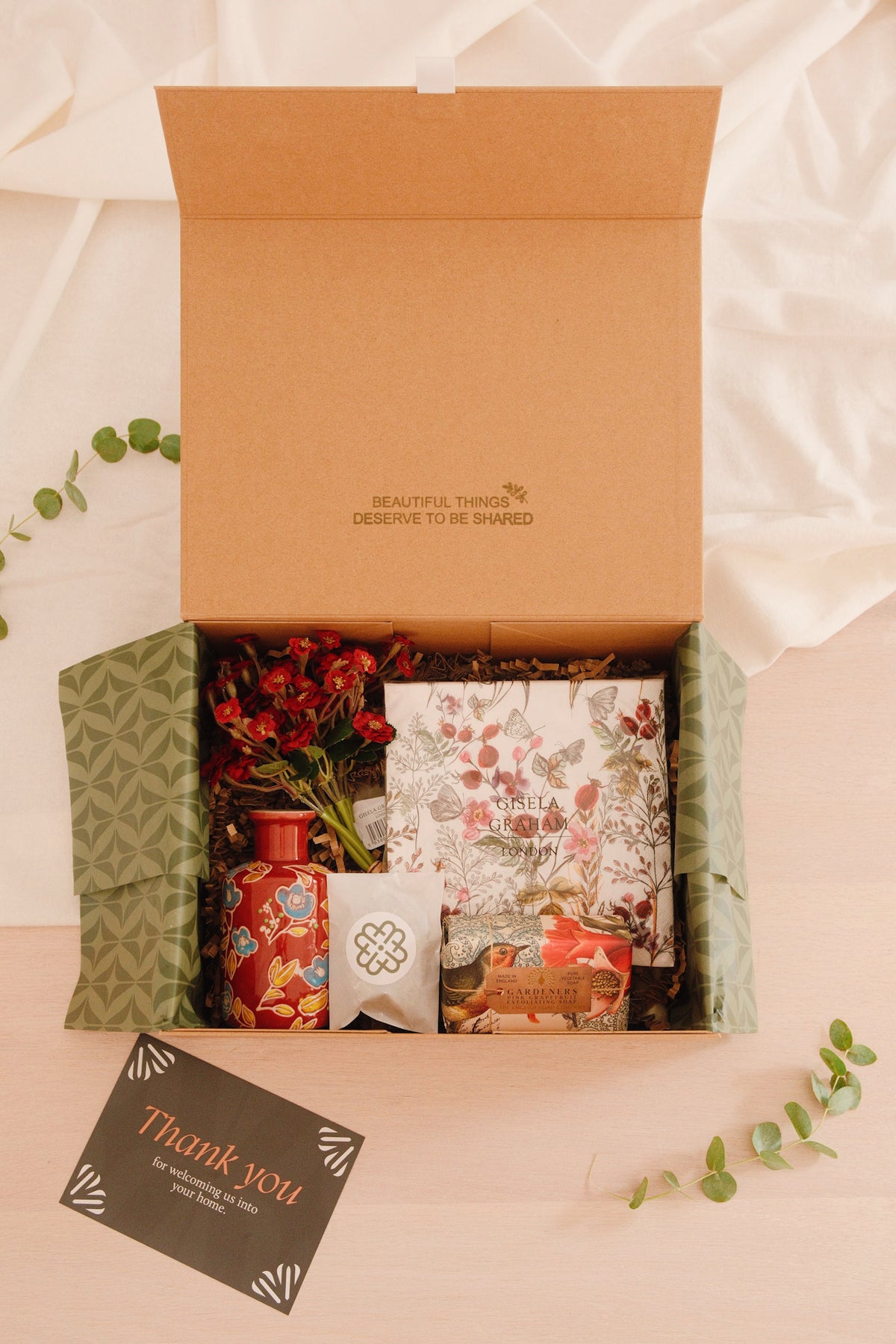 Winter botanical country home gift box with green leaf mug, Gisela Graham Winter Fir candle and botanical napkins