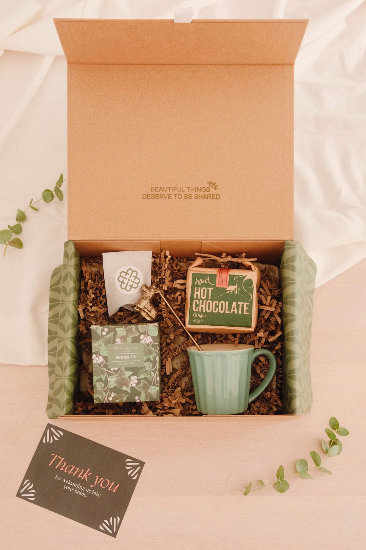 Winter hot chocolate gift box with green ceramic mug, Harth Ginger Hot Chocolate and Gisela Graham Winter Fir candle